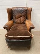 A leather Art Deco wing back arm chair in the style of Zimmer AF