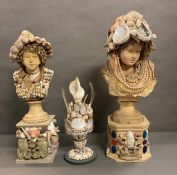Two marine themed busts on plinths with shell and bead decoration and a marina themed sculpture