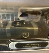 A Yat Ming Diecast model of a 1961 Lincoln X-100 Kennedy Car