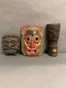 Three tribal wooden masks