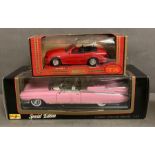 Two boxed Diecast cars, a Cadillac Eldorado and a Mercedes 500SL