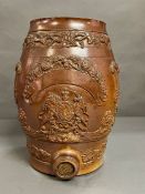 An 19th Century brown salt glazed stoneware spirit barrel with Royal Coats of Arms (H31cm)