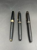 Three fountain pens, Parker 17, Parker Victory and a Swan