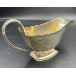 A hallmarked silver sauce boat by Z Barraclough & Sons, dated Chester 1930 (Approximate weight