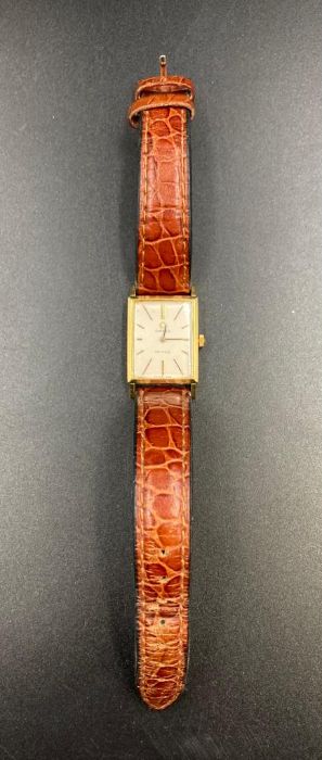 A Gents 18ct gold Omega De Ville watch on a leather strap.