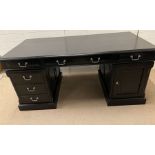 A black contemporary pedestal desk with chrome handles (H79cm W170cm D80cm)