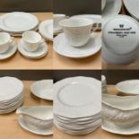 A part services of Wedgwood "Strawberry and Vine" dinner plates and cups