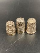 A selection of three silver thimbles