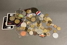 A selection of coins and tokens, various years, denomations and countries