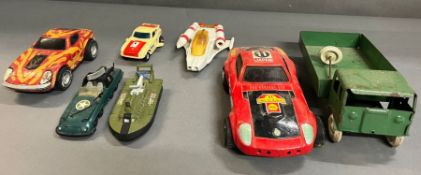A selection of tin and Diecast lorries and cars