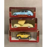 A selection of three Rex toys Diecast models, a Ford Sedan and two Cadillac