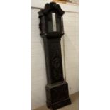 An ornate hand carved oak long case clock casement AF