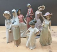 Seven Nao figurines, various style