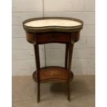 A Louis style kidney shaped side table with marble top and brass fittings