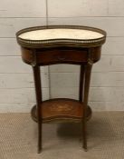 A Louis style kidney shaped side table with marble top and brass fittings