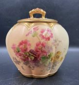 A Royal Worcester blush ivory lidded jar with floral decoration