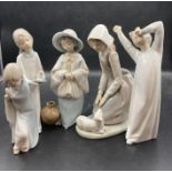 Three Lladro figurines and two Nao figures