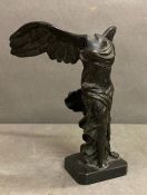 A bronze statue of an angel
