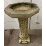 A garden bird bath with scrolling base (H57cm)