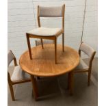 A large Danish dining table and chairs, stamped Findahls Mobler