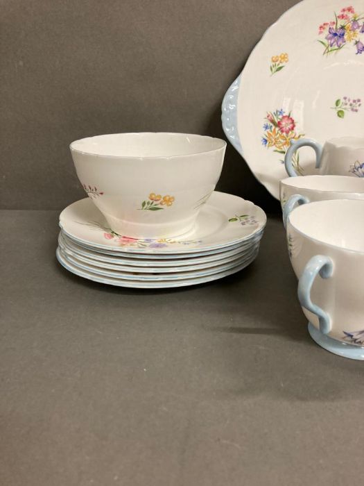A part Shelly tea service "Wild Flowers" to include cups, saucers and a milk jug - Image 4 of 4