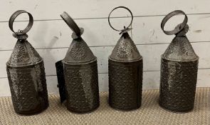 Four vintage punched tin lanterns