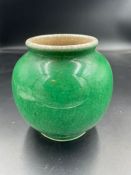 An 18th/19th Century Chinese vase on green grounds.11cm H