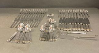 An Extensive Cristofle silver plated 'Gold Bands' twelve place setting cutlery set in original boxes