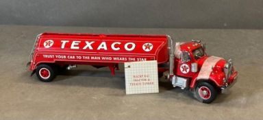 A Franklin Mint Diecast model of a Mack B-61 Tractor and Texaco Tanker