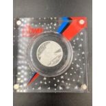 A 2020 commemorative David Bowie silver coin