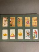 Two albums of cigarette cards to include Players and Ogdens