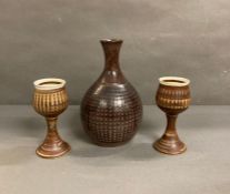 Two Iden pottery rye goblets and vase