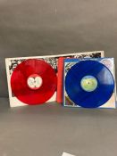 A Beatles 1962 - 1966 on red vinyl and a "The Beatles 1967 - 1970 on blue vinyl