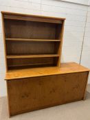 A sideboard, open to drawer and open bookcase above (H181cm W175cm D60cm)