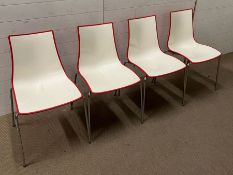 Four Zebra Bicolore scab chairs, two tone body on chromed tubular frame