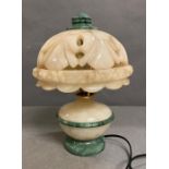 A green and white marble desk lamp