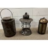 three tin lanterns