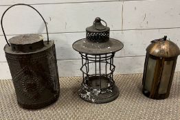 three tin lanterns