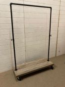 An industrial style hanging rail on castors (H160cm W100cm D40cm)