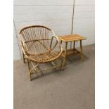 A rattan/cane Mid Century arm chair and table