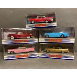 A selection of five Matchbox Diecast Dinky toy cars