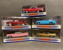 A selection of five Matchbox Diecast Dinky toy cars