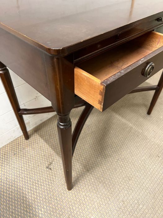 A mahogany side table and writing shelf with tapering legs and cross stretchers (H74cm W83cm D48cm) - Image 4 of 7