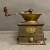 A vintage Kendrick cast iron and brass coffee grinder