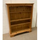 A Ducal pine three shelf bookcase