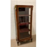 A Louis style mahogany three shelf display cabinet finished with a red velvet interior