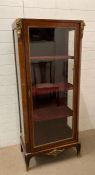 A Louis style mahogany three shelf display cabinet finished with a red velvet interior