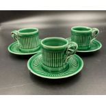 Three green glazed Este Ceramiche for Tiffany & Co coffee cups and saucers.