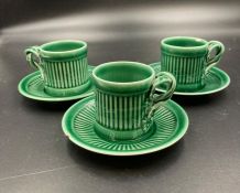 Three green glazed Este Ceramiche for Tiffany & Co coffee cups and saucers.