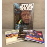 A Star Wars collectors Editions "The Battles" 1998 calendar and three Start Wars collectors books